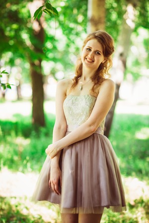 Beautiful girl on natural backgroundの写真素材