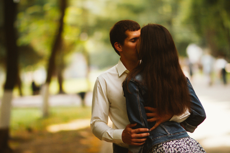 Black and white photo beautiful young couple in the parkの写真素材
