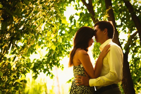 Beautiful young couple in the parkの写真素材