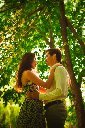 Beautiful young couple in the parkの写真素材