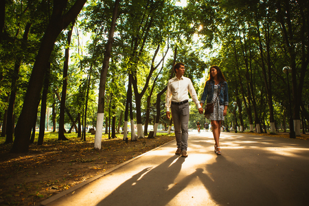 Black and white photo beautiful young couple in the parkの写真素材