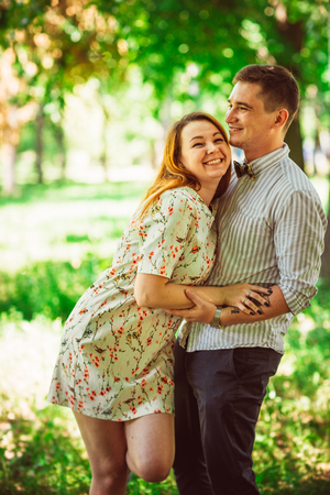 Beautiful couple on a natural backgroundの写真素材