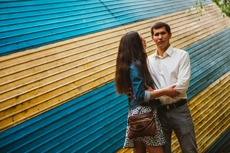 Beautiful young couple on the city backgroundの写真素材
