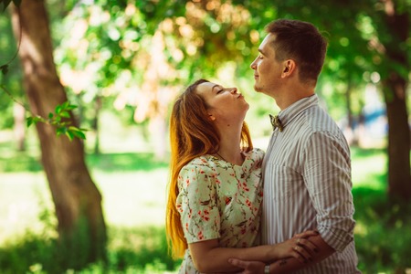 Beautiful couple on a natural backgroundの写真素材