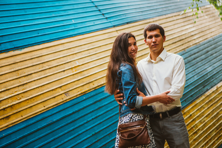 Beautiful young couple on the city backgroundの写真素材