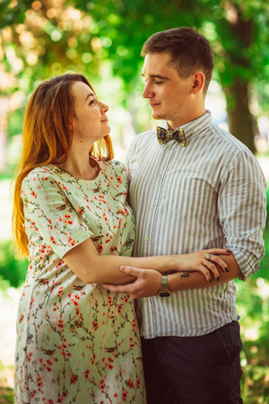 Beautiful couple on a natural backgroundの写真素材
