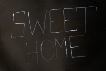 Sweet Home inscription on black backgroundの写真素材