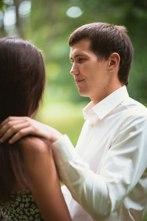 Beautiful young couple in the parkの写真素材