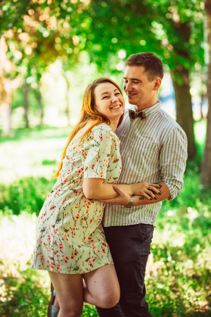 Beautiful couple on a natural backgroundの写真素材