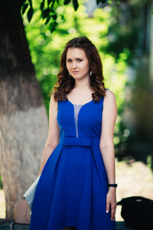 Beautiful girl on natural backgroundの写真素材