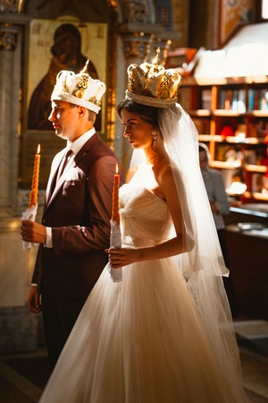 newlyweds wedding ceremony in the church,wedding ceremony, glansの写真素材