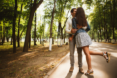 Black and white photo beautiful young couple in the parkの写真素材