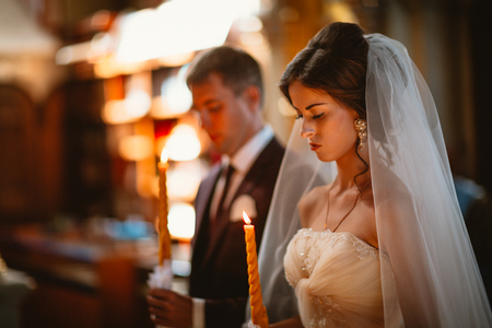 newlyweds wedding ceremony in the church,wedding ceremony, glansの写真素材