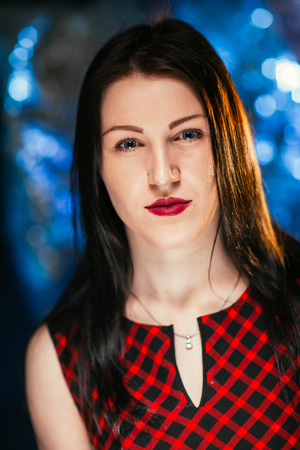 Portrait of a girl on a blurred background.の写真素材