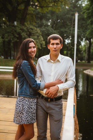 Beautiful young couple on the waterfrontの写真素材