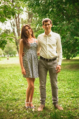 Beautiful young couple in the parkの写真素材