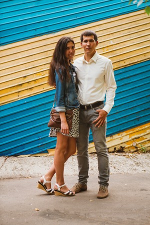 Beautiful young couple on the city backgroundの写真素材