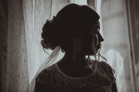 portrait of a young bride on a light backgroundの写真素材