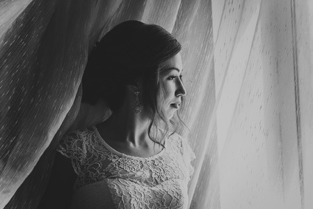 portrait of a young bride on a light backgroundの写真素材