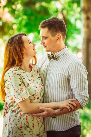 Beautiful couple on a natural backgroundの写真素材