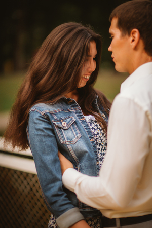 Beautiful young couple on the waterfrontの写真素材