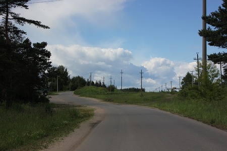 beautiful summer landscape of the park with a roadの写真素材