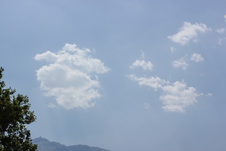 White clouds in the sky are photographed at the height of the flight of the aircraftの写真素材