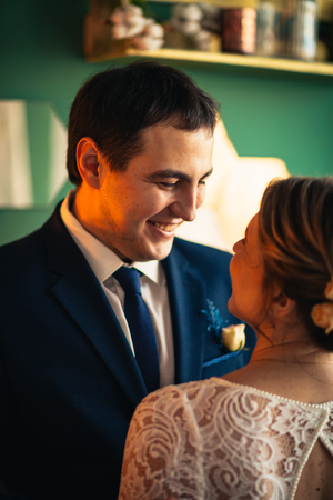 couple groom and bride in light studio.の写真素材