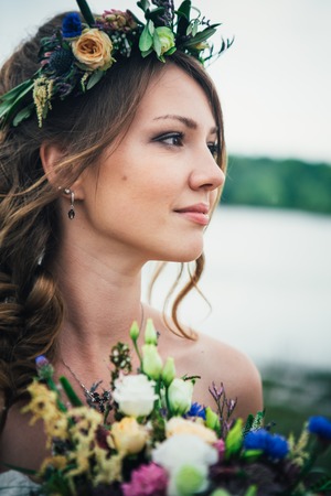 portrait of the bride against the background of the river.の写真素材