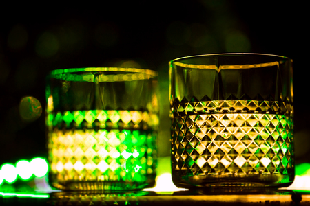 bar colored lights with glasses of alcohol.