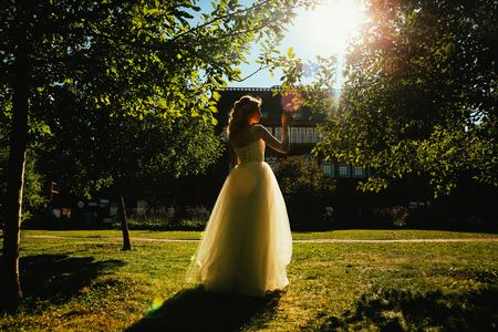 beautiful young bride in the garden background.の写真素材