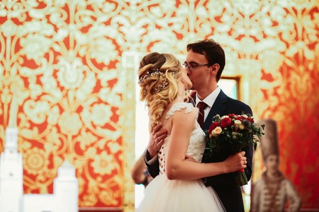 bride and groom on the background of the Kolomna Palace.の写真素材