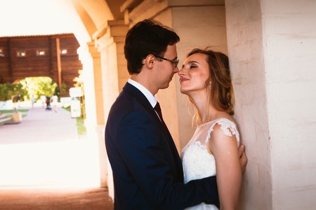 bride and groom on the background of the Kolomna Palace.の写真素材