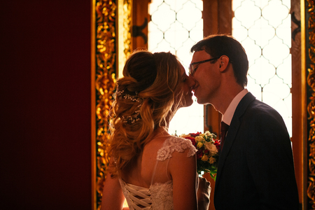 bride and groom on the background of the Kolomna Palace.の写真素材