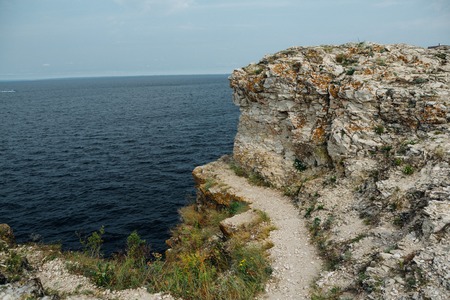 landscape river cliff grass on the sky background.の写真素材
