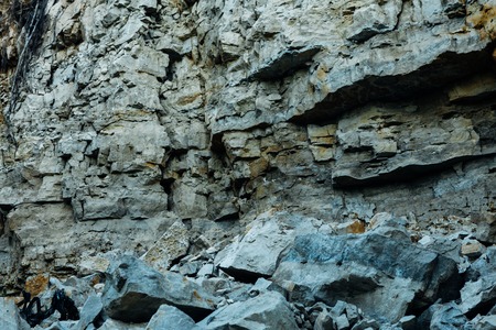 dark detailed grey stone background close up.の写真素材