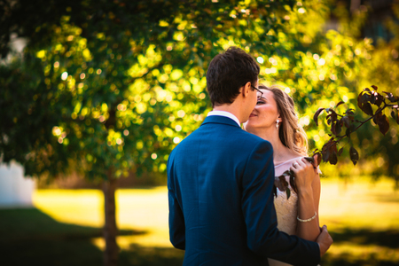 bride and groom on background summer forest.の写真素材