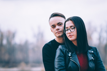 man and woman near the river autumn.の写真素材