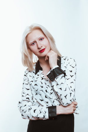 portrait blonde albino girl in studio on white background.の写真素材