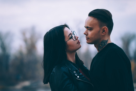 man and woman near the river autumn.の写真素材