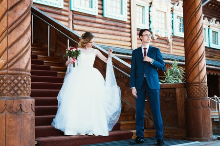 bride and groom on the background of the Kolomna Palace.の写真素材