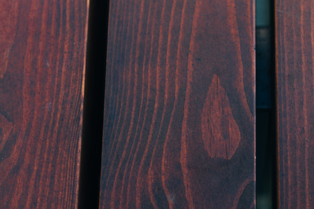 red black wooden background close up.の写真素材
