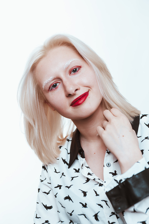 portrait blonde albino girl in studio on white background.の写真素材