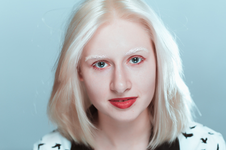 portrait of blonde albino girl in studio.の写真素材