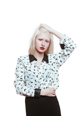 portrait blonde albino girl in studio on white background.の写真素材
