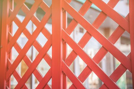 red wooden fence background in the streetの写真素材
