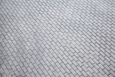 gray stone tile top view from the sideの写真素材