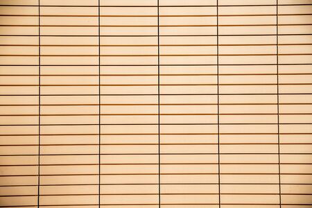 yellow horizontal wood wall from boardsの写真素材