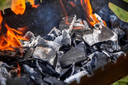coals burn in the grillの写真素材