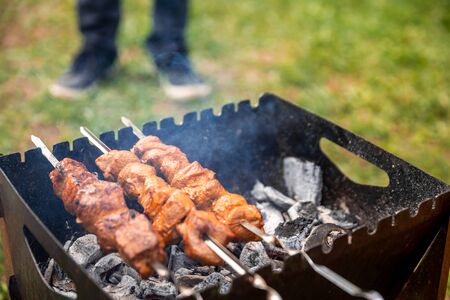 barbecue cooked on coals in a barbecue on the natureの写真素材